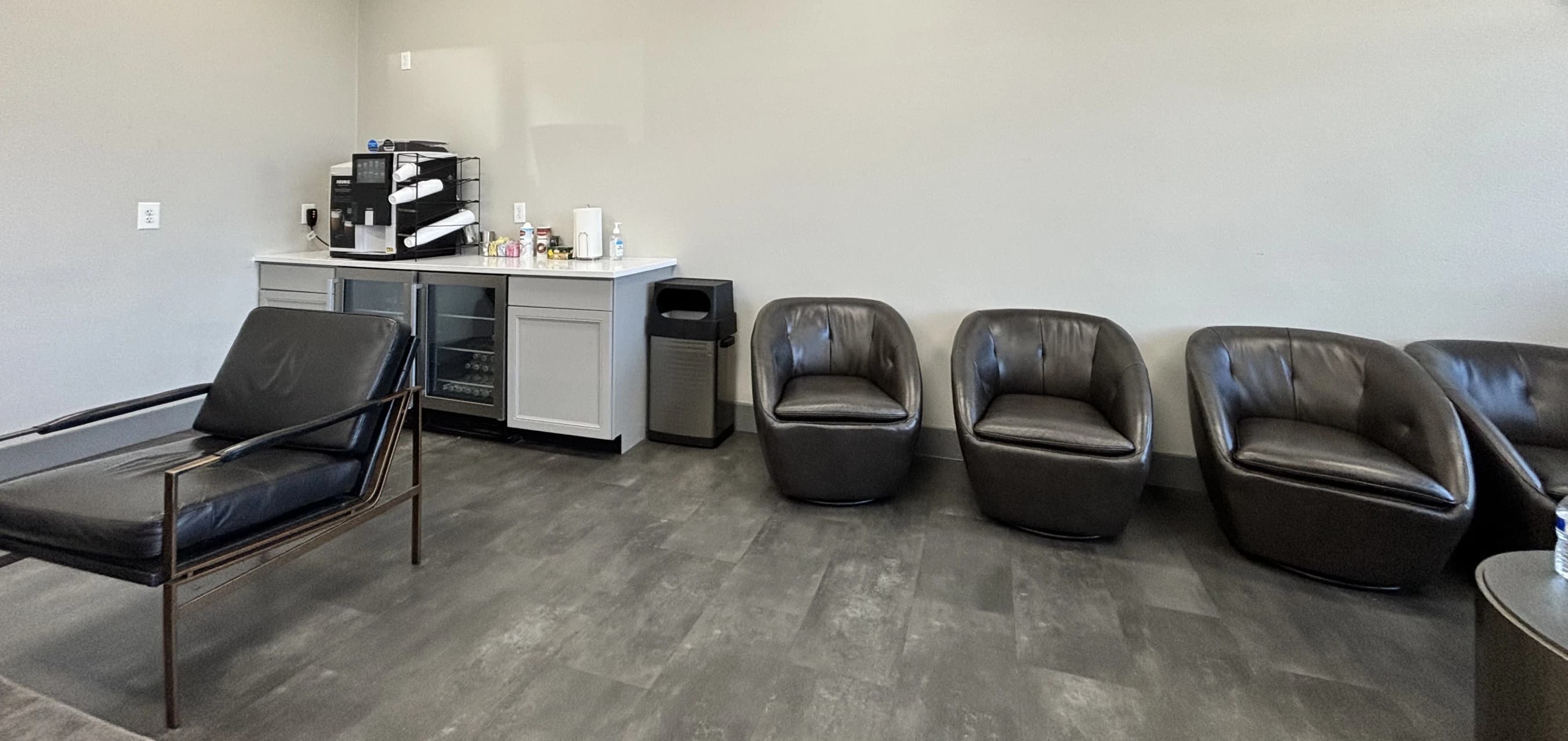 Uncomfortable waiting room with broken chairs and no amenities